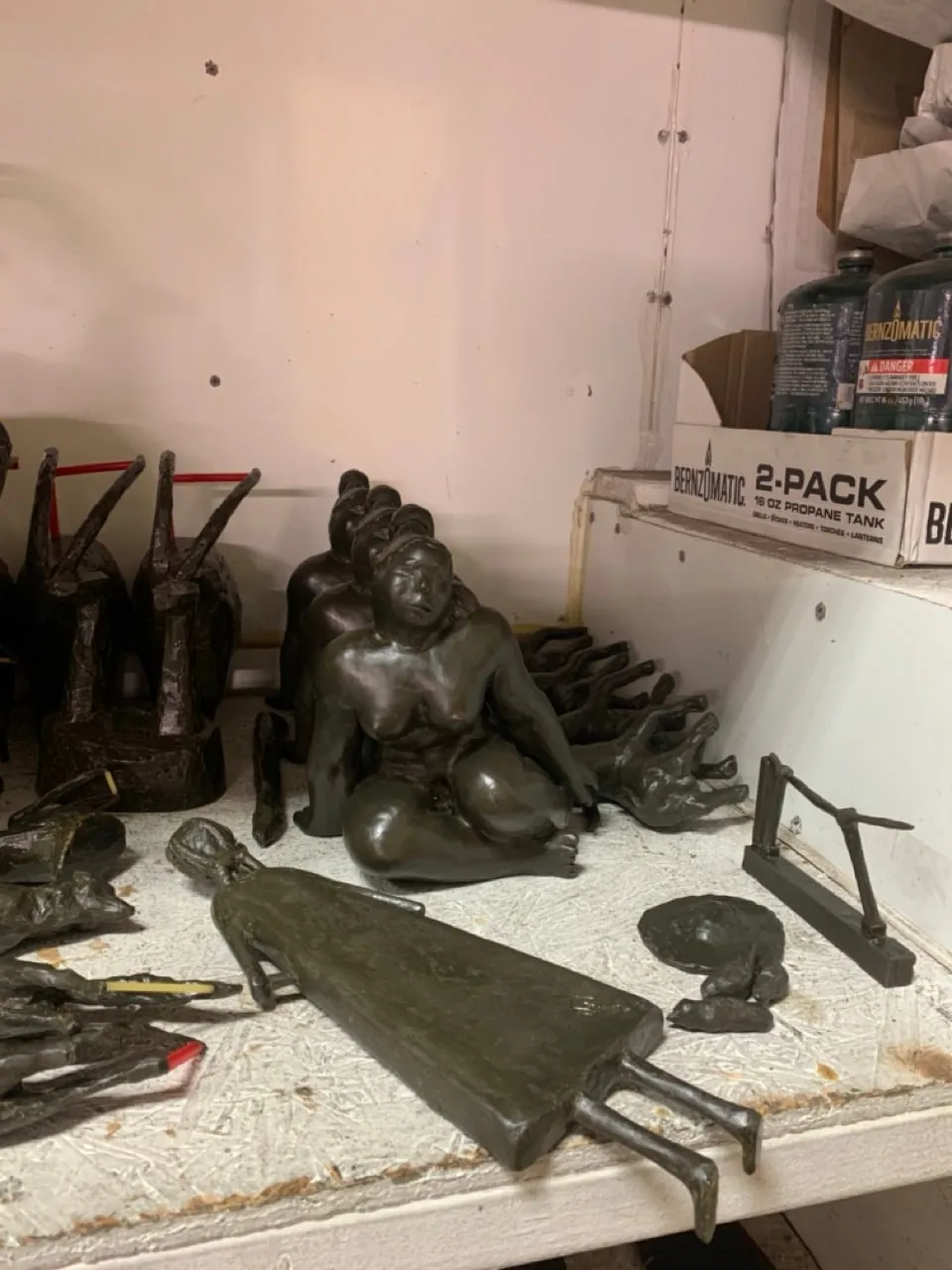 Wax rods and gates on a shelf, ready to be attached