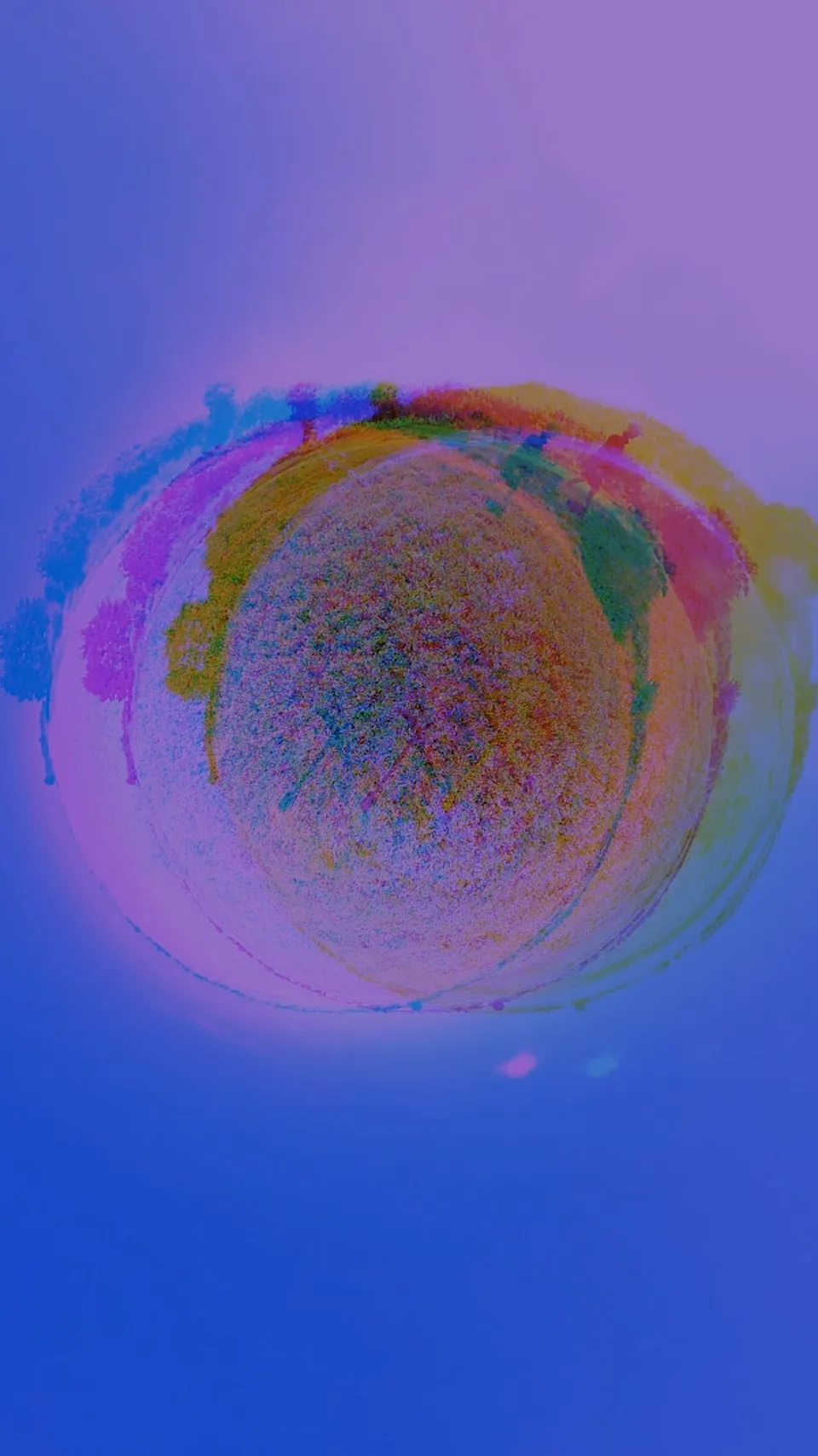 A landscape wrapped into a small round planet, split into pink, blue and gold colour fringes